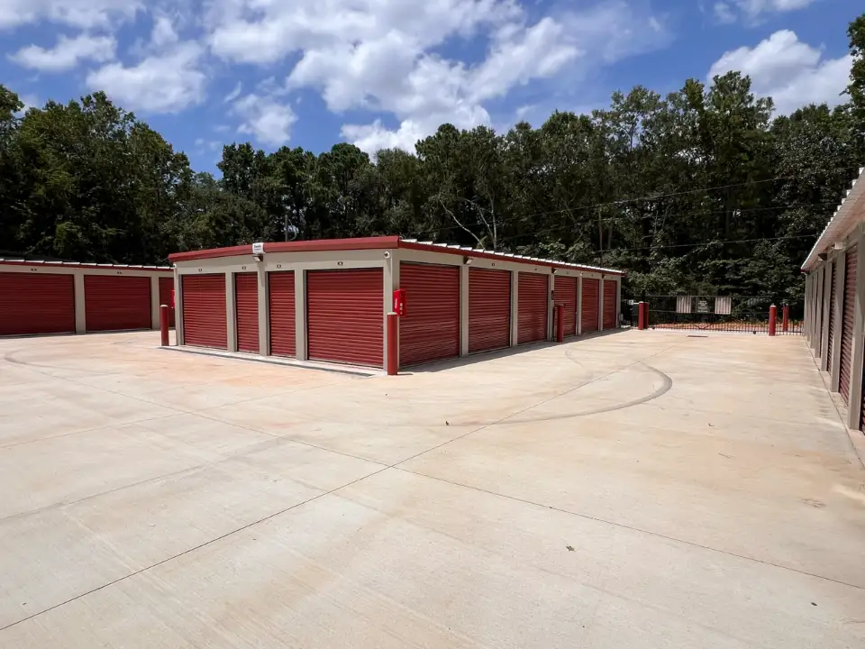 Rows of drive-up storage units at Cedar Storage in Willis, TX